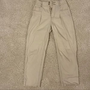 White cream pants with brown lining